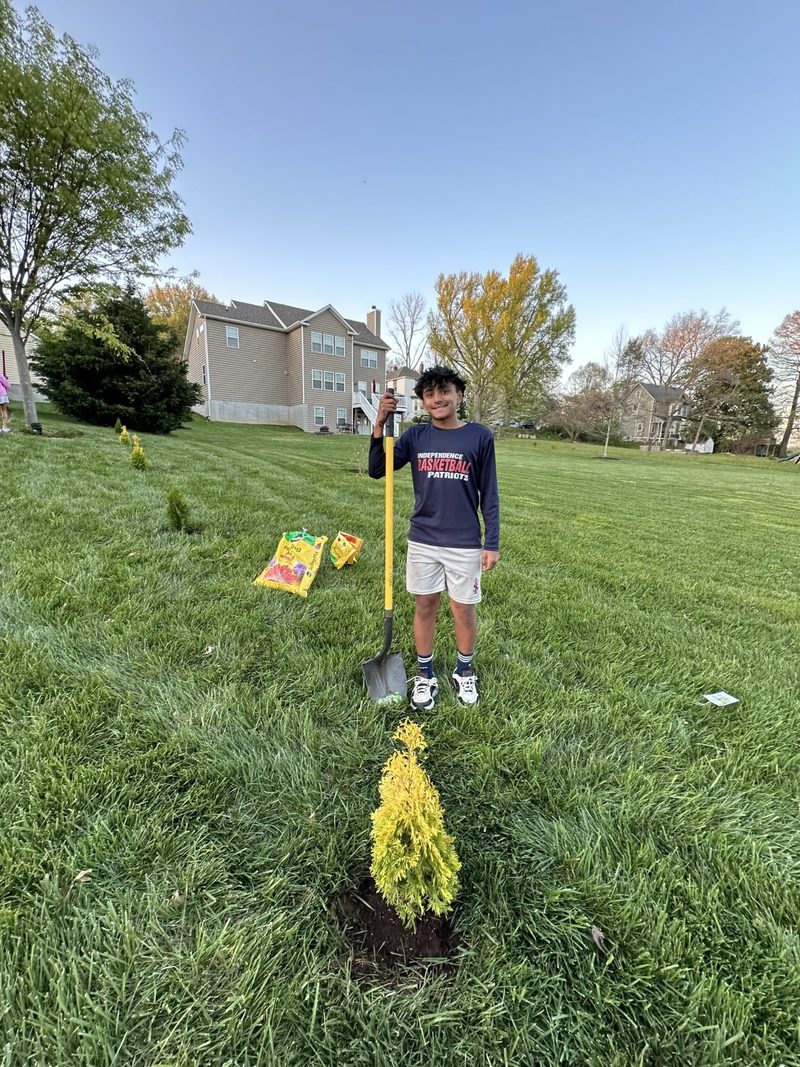 Dhruv planting tree on Earth Day 2024