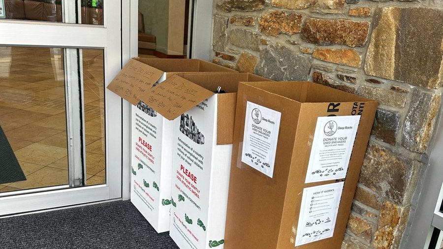 Deep Roots shoe collection boxes at Hockessin Athletic Club